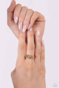 Glistening silver letters arc across the finger, forming the word "LOVE" for a causally romantic finish. The letter "O" features a Classic Green-painted peace sign, the letter "V" features various shades of multicolored rhinestones, while a Pink Peacock-painted heart caps the word, infusing the design with color. Features a dainty stretchy band for a flexible fit.  Sold as one individual ring.
