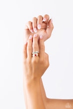 Load image into Gallery viewer, Featuring the phrase &quot;God is Good&quot; in a turquoise font and a red-painted heart, two sleek gold bands delicately overlap across the finger for a religious-inspired look. Features a dainty stretchy band for a flexible fit.  Sold as one individual ring.
