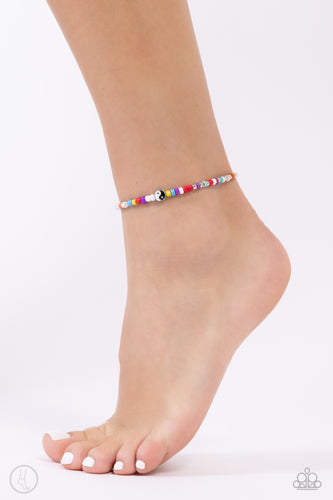 Infused along an elastic stretchy band, multicolored seed beads, silver studs, circular colored stones, a silver star, and a yin-yang bead coalesce around the ankle for a fun-loving display. Sold as one individual anklet.