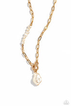 Load image into Gallery viewer, Featuring an elegant lariat closure, an oversized, baroque white pearl cascades from the bottom of a gold paperclip chain for a refined fashion. Dainty, glossy baroque pearl beads are infused along one side of the gold chain for an additional touch of abstract sheen to the charming design.  Sold as one individual necklace. Includes one pair of matching earrings.

