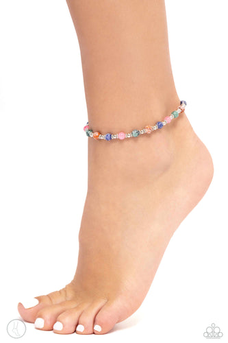 Infused with silver accents and floral beads, a colorful collection of natural stones are threaded around the ankle for a tranquil look. As the stone elements in this piece are natural, some color variation is normal. Sold as one individual anklet.