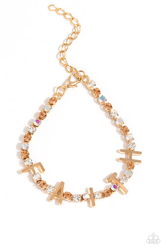 Set in gold square fittings, various multicolored rhinestones gleam around the wrist. Infused along the design, sleek gold letters spell out the word 