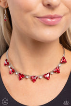 Load image into Gallery viewer, Suspended from two silver fittings, a shimmery cascade of dainty silver chains layer around the collar for an industrial statement. Infused amongst the industrial strands, a collection of pronged white gems alternate with pronged red triangular gems for a touch of gritty color. Features an adjustable clasp closure.  Sold as one individual choker necklace. Includes one pair of matching earrings.
