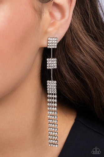 Enveloped in white rhinestones, three interconnected square frames cascade down the ear resulting in a dazzling drop of glitz. Featuring sleek square fittings, strands of glittery white rhinestones freefall from the lowermost square frame, creating a glamorous fringe. Earring attaches to a standard post fitting.  Sold as one pair of post earrings.