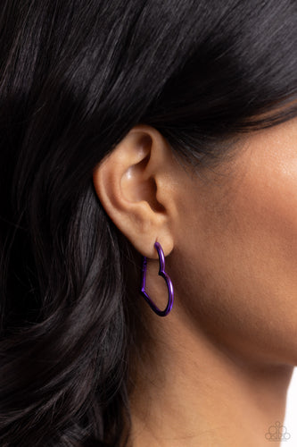 Featuring an electric purple hue, a heart silhouette hoop snugly curls around the ear for a colorfully romantic display. Earring attaches to a standard hinge closure fitting. Hoop measures approximately 1 1/2