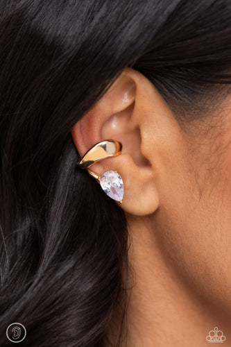 <p>Fluttering atop a pronged gold fitting, a white gem teardrop shines from the ear. Features a smooth surface for sliding ability to desired position on the ear. Due to its structure, adjusting capability is limited.</p> <p><i> Sold as one pair of cuff earrings.</i></p>