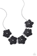 Load image into Gallery viewer, Featuring silver stud centers, a collection of 3D black leather flowers connect to a classic silver chain for a ruggedly retro look. Features an adjustable clasp closure. Sold as one individual necklace. Includes one pair of matching earrings.

