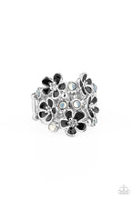 Load image into Gallery viewer, A whimsical collection of glassy white beads and shiny black floral frames dot three shimmery silver bands across the finger, coalescing into a colorful centerpiece. Features a stretchy band for a flexible fit. Sold as one individual ring.
