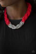 Load image into Gallery viewer, Strands of red seed beads create an indigenous braid below the collar. The red seed beads gradually morph into metallic silver beads at the center for a chic contrasting look. Features an adjustable clasp closure. Sold as one individual necklace. Includes one pair of matching earrings.
