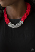 Load image into Gallery viewer, Strands of red seed beads create an indigenous braid below the collar. The red seed beads gradually morph into metallic silver beads at the center for a chic contrasting look. Features an adjustable clasp closure.  Sold as one individual necklace. Includes one pair of matching earrings.
