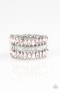 Featuring refined marquise cuts, glittery pink rhinestones flare from a center of glassy white rhinestones, creating a regal band across the finger. Features a stretchy band for a flexible fit. Sold as one individual ring.