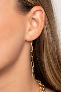 Gold oval links hanging from a gold fish hook earring.