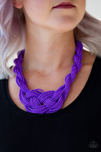Load image into Gallery viewer, Countless strands of purple seed beads are twisted and knotted together to create an unforgettable statement piece. Features an adjustable clasp closure.  Sold as one individual necklace. Includes one pair of matching earrings.
