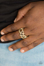 Load image into Gallery viewer, Encrusted in golden topaz rhinestones, shimmery brass bars crisscross across the finger, coalescing into a bold square knot atop the finger. Features a stretchy band for a flexible fit. Sold as one individual ring.
