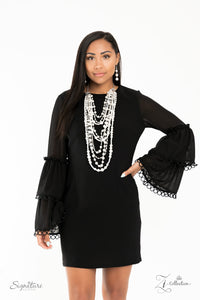 An elegant collection of timeless white pearls, shiny sections of silver chain, and bedazzling white rhinestone encrusted silver beads effortlessly cascade down the chest. The vintage inspired layers drape into breathtaking rows of radiance, resulting in an irresistible collision of romance. Features an adjustable clasp closure.