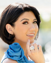 Load image into Gallery viewer, A studded silver frame, filled with blinding oval-cut gems in opalescent, white, and iridescent shades, stands out atop the finger for a blingy statement. Features a stretchy band for a flexible fit. Due to its prismatic palette, color may vary.  Sold as one individual ring.
